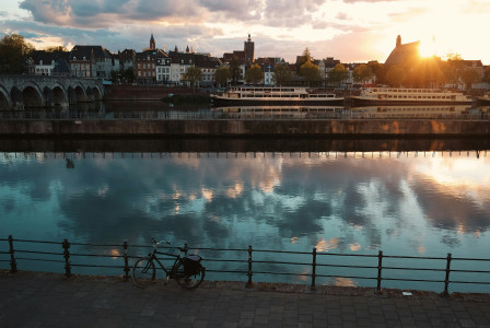 Photo by Unsplash An illustrative photo of a bike parked next to a fence.