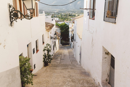 An illustrative photo of a white concrete building