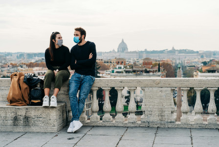 An illustrative photo of a man sitting beside woman.