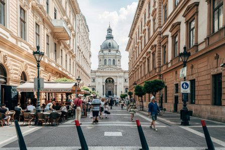 An illustrative photo of people walking on street.