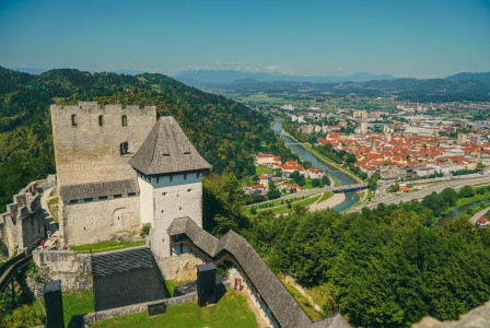 An illustrative photo of a view of a city from the top of a castle.