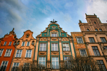An illustrative photo of buildings of different colours in Gdansk, Poland
