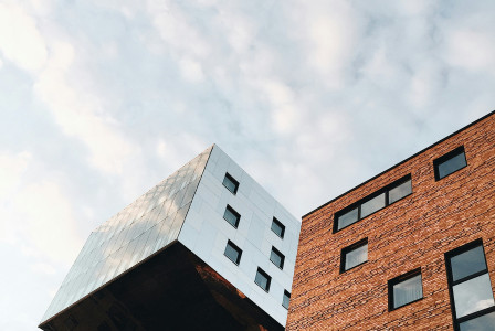 An illustrative photo of a brown and gray concrete building in Germany