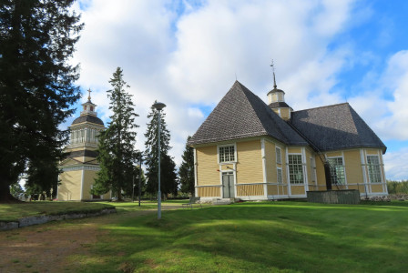 Photo by Unsplash An illustrative photo of a large yellow house with two towers on top of it
