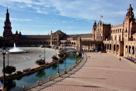 An illustrative photo of a square with fountain in Seville, Spain