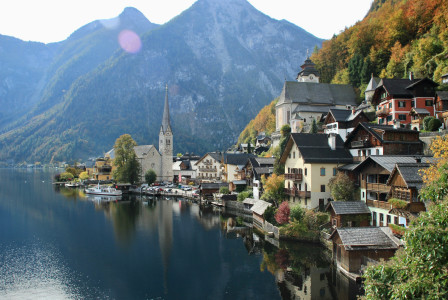 An illustrative photo of a lake surrounded by mountains.