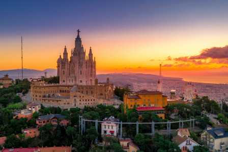 An illustrative photo of a view of Barcelona, Spain during sunset