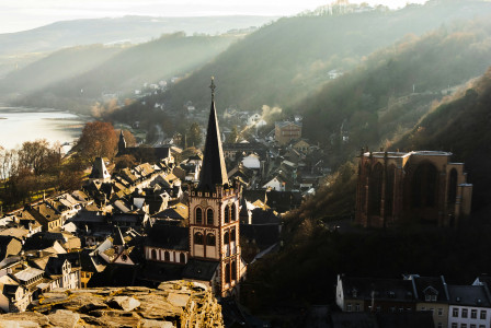 An illustrative photo of a view of a town near mountains
