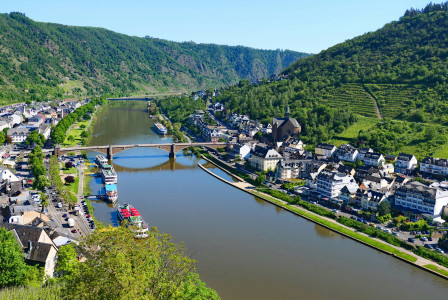 Photo by Unsplash An illustrative photo of a river running through a lush green hillside