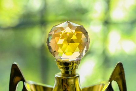 Photo by Unsplash An illustrative photo of a golden metal trophy with a crystal ball on top of it