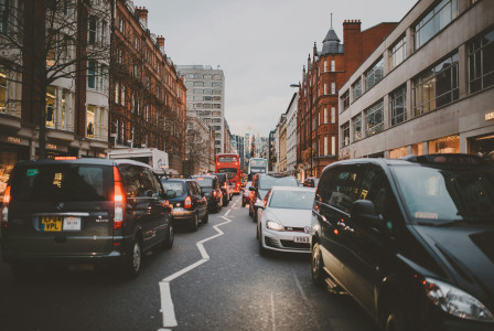 Photo by Unsplash An illustrative photo of wide road with vehicles