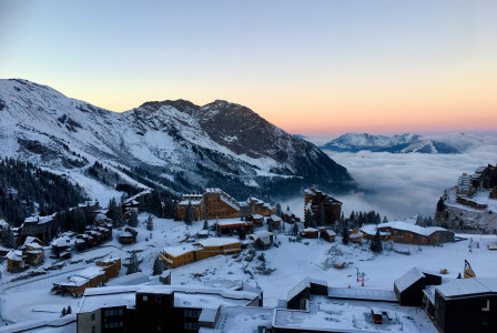 An illustrative photo of a view of a snowy mountain town.