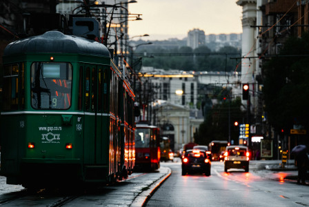An illustrative photo of a city street filled with traffic.