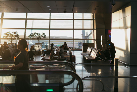 An illustrative photo of people sitting in the airport