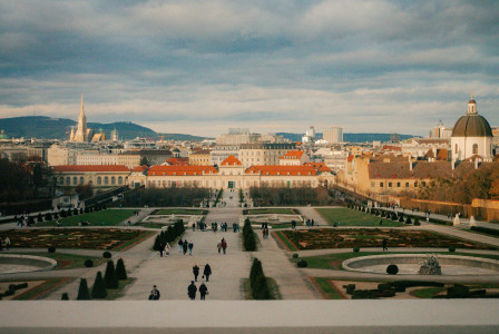An illustrative photo of a view of a city from the top of a building.