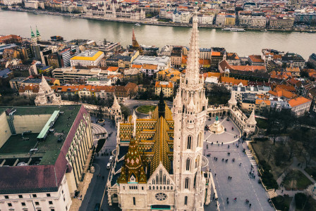 An illustrative photo of a view of a city near a river