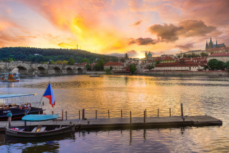 An illustrative photo of a boat on dock during sunset