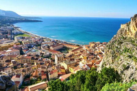 An illustrative photo of a city next to the ocean