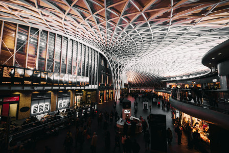 An illustrative photo of a modern train station with lights.