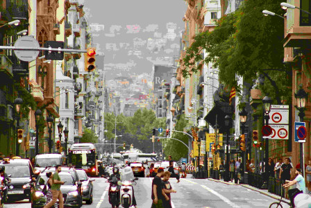 An illustrative photo of people walking on a street with traffic.