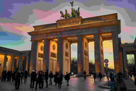 An illustrative photo of a group of people standing in front of the Brandenburg Gate.