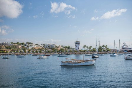 Photo by Unsplash An illustrative photo of a group of boats floating on top of a body of water.