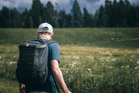 An illustrative photo of a person in a field.