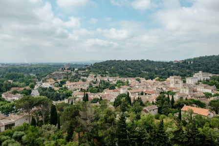 An illustrative photo of a view of a city from a hill.