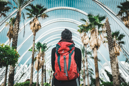 Photo by Unsplash An illustrative photo of a man carrying a backpack.