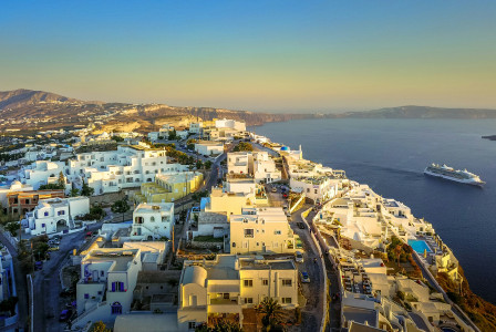 An illustrative photo of city buildings during daytime.