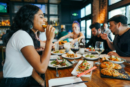 Photo by Unsplash An illustrative photo of a woman eating.