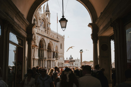 An illustrative photo of people and buildings.