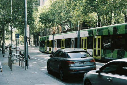 An illustrative photo of a city street filled with lots of traffic.