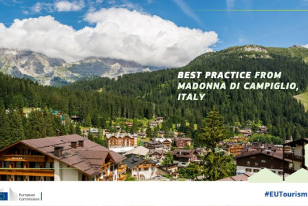 Photo by Sustainable EU Tourism project An illustrative photo of mountains and buildings.