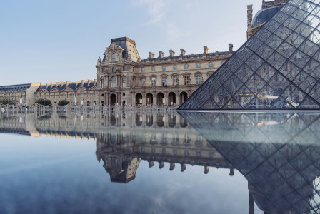 An illustrative photo of the Louvre Museum in France.