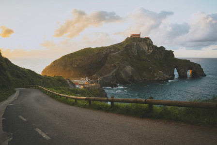 Photo by Unsplash An illustrative photo of a road near a body of water.