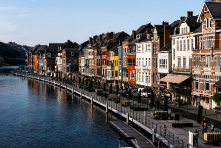 An illustrative photo of buildings near a body of water.