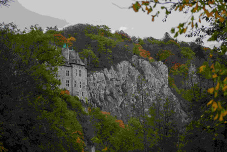 An illustrative photo of a castle on a mountain.