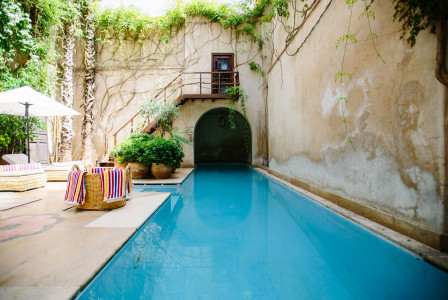 An illustrative photo of a swimming pool in a hotel.