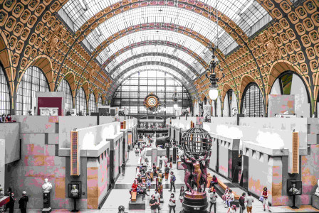 Photo by Unsplash An illustrative photo of people walking inside of a museum.