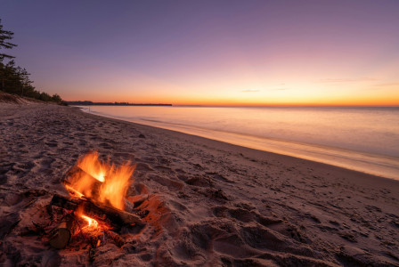 Photo by Unsplash An illustrative photo of a fire on a beach.