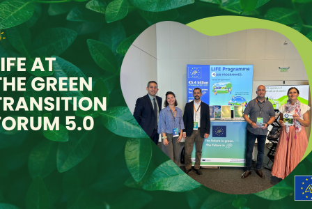 People standing in front of a banner