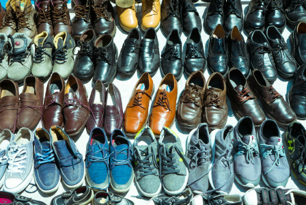 Batch of leather shoes. Colour photograph of batch of leather shoes in assorted colours.