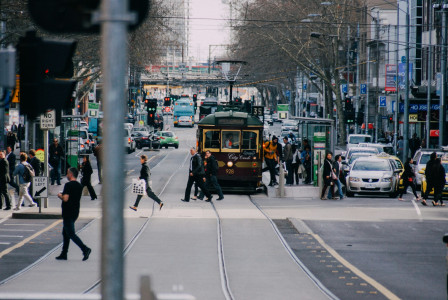 Photo by Unsplash An illustrative photo of people crossing road.