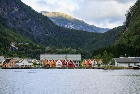 a-body-of-water-with-a-bunch-of-nordic houses-on-it