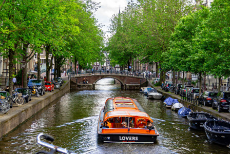 orange boat on the canal in the netherlands