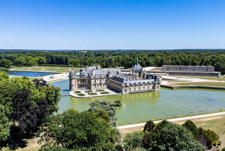 Photo by Unsplash A castle on a hill by a river