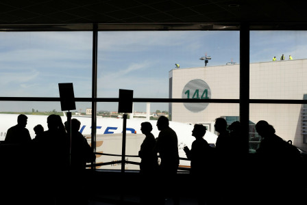 Photo by Unsplash A group of people in the airport