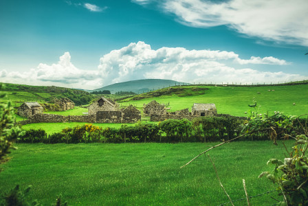Stone houses in the green fields