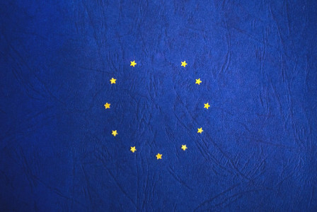 Yellow EU stars on blue colour textile